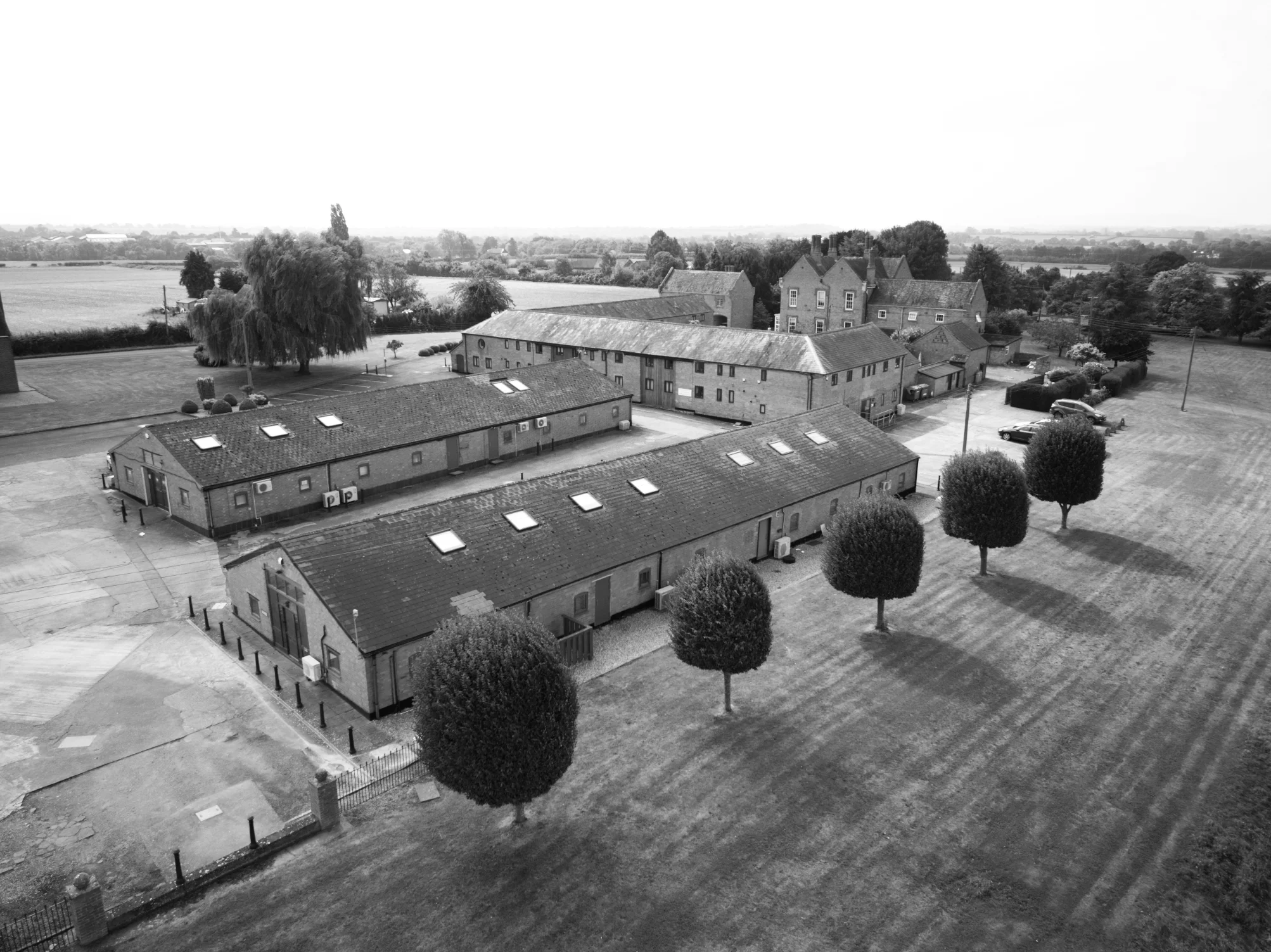 Aerial view of AlphaQuad office on Wixford Park looking from the fields towards Bidford in Warwickshire